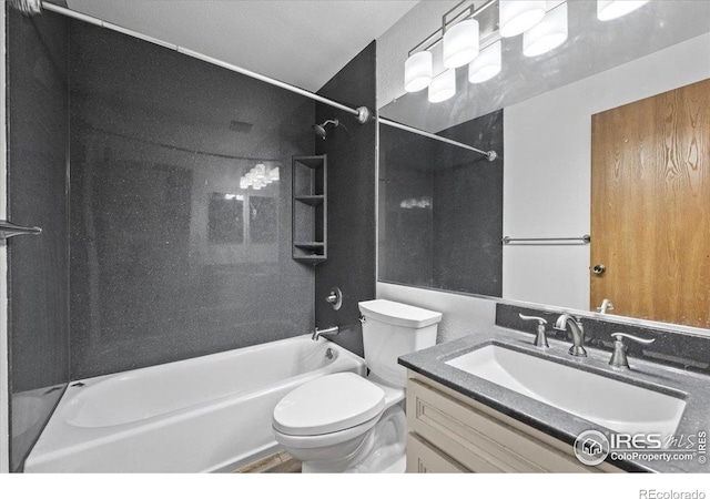 7820 W 87th Dr Unit K, Arvada, CO 80005 - bathroom featuring bathing tub / shower combination, toilet, and vanity
