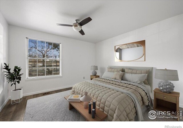 7820 W 87th Dr Unit K, Arvada, CO 80005 - bedroom featuring wood finished floors, baseboards, and ceiling fan