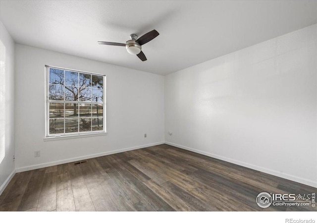 7820 W 87th Dr Unit K, Arvada, CO 80005 - spare room with wood finished floors, ceiling fan, and baseboards