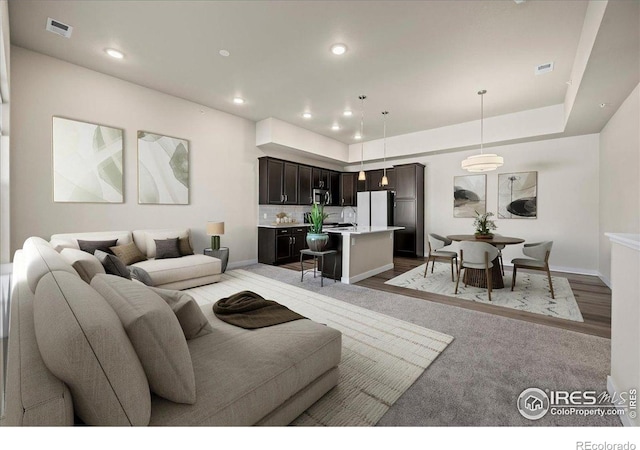350 High Point Dr Unit 201, Longmont, CO 80504 - living room featuring baseboards and recessed lighting