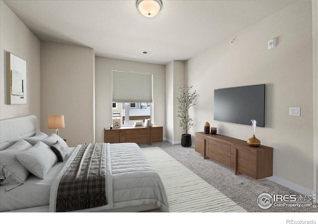 350 High Point Dr Unit 201, Longmont, CO 80504 - bedroom featuring light colored carpet and baseboards
