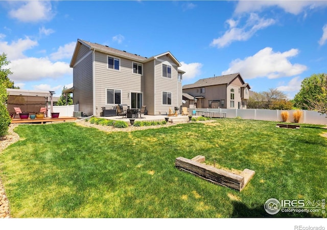 back of property featuring a patio area