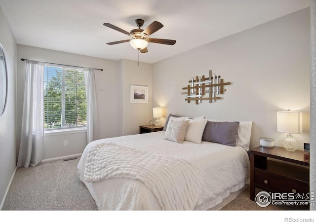 4416 Pika Dr, Loveland, CO 80537 - bedroom with carpet floors, baseboards, and ceiling fan