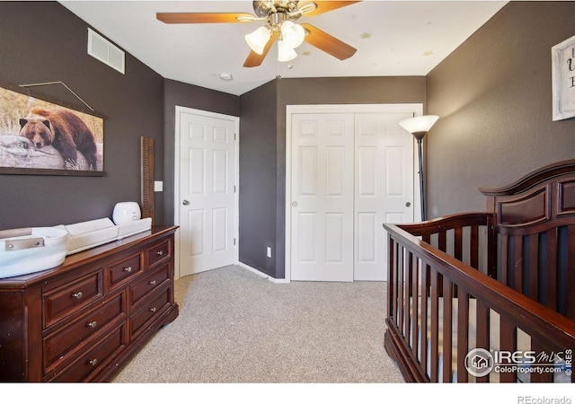 4416 Pika Dr, Loveland, CO 80537 - bedroom featuring a closet, light carpet, and ceiling fan