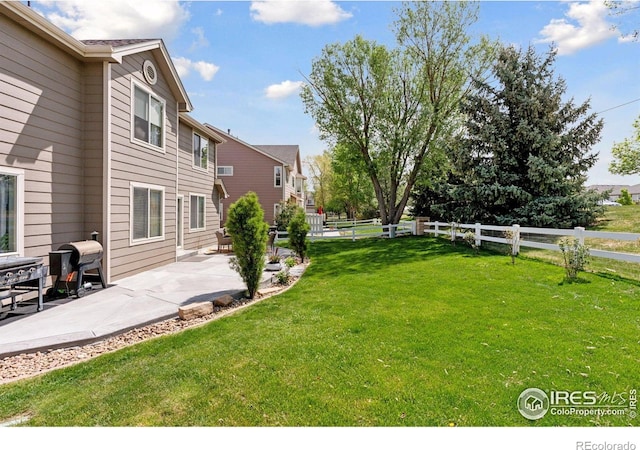 4416 Pika Dr, Loveland, CO 80537 - view of yard with a patio