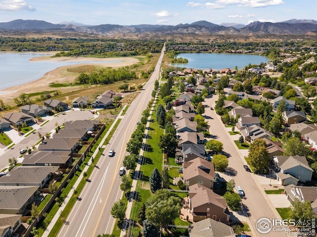 4416 Pika Dr, Loveland, CO 80537 - aerial perspective of suburban area featuring a water and mountain view