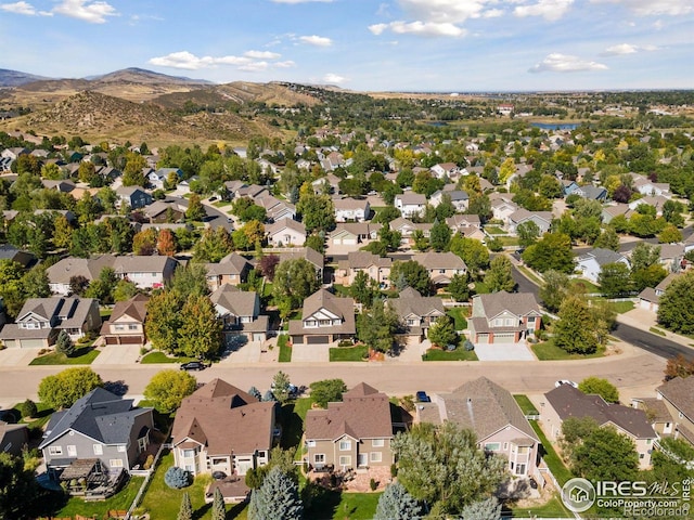 4416 Pika Dr, Loveland, CO 80537 - aerial perspective of suburban area featuring a mountain backdrop