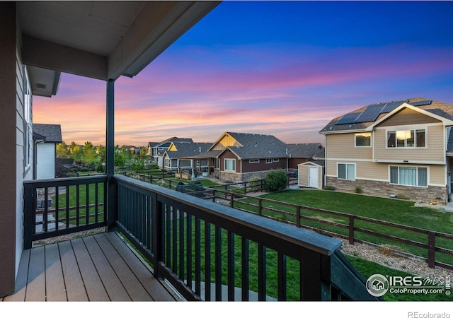 2119 Pelican Farm Rd, Windsor, CO 80550 - balcony at dusk with a residential view