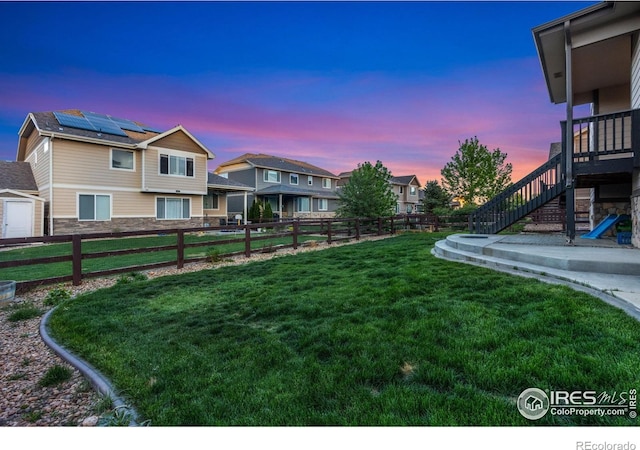2119 Pelican Farm Rd, Windsor, CO 80550 - yard at dusk with stairway