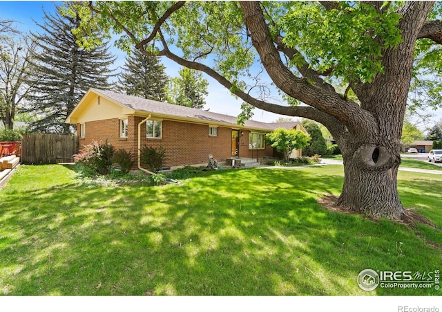1320 Lory St, Fort Collins, CO 80524 - view of front of home with brick siding
