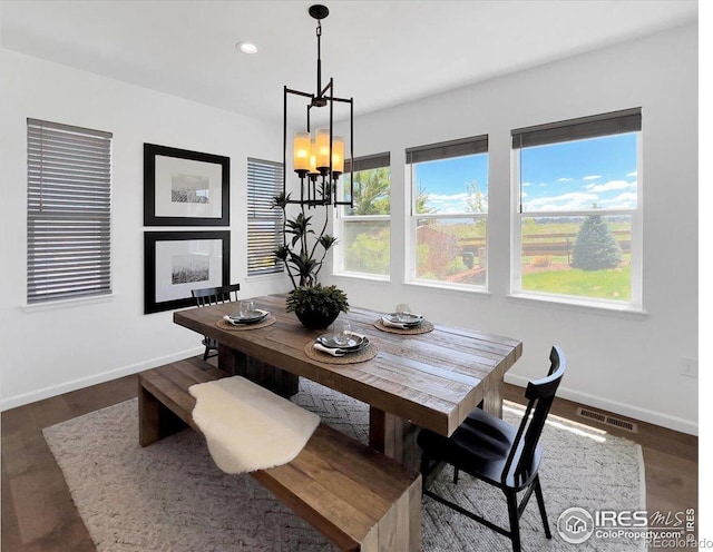 6506 Merrimack Dr, Castle Pines, CO 80108 - dining space with baseboards, a chandelier, recessed lighting, and dark wood finished floors