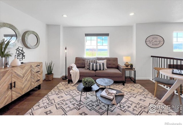 6506 Merrimack Dr, Castle Pines, CO 80108 - living area featuring plenty of natural light, dark wood finished floors, baseboards, and recessed lighting