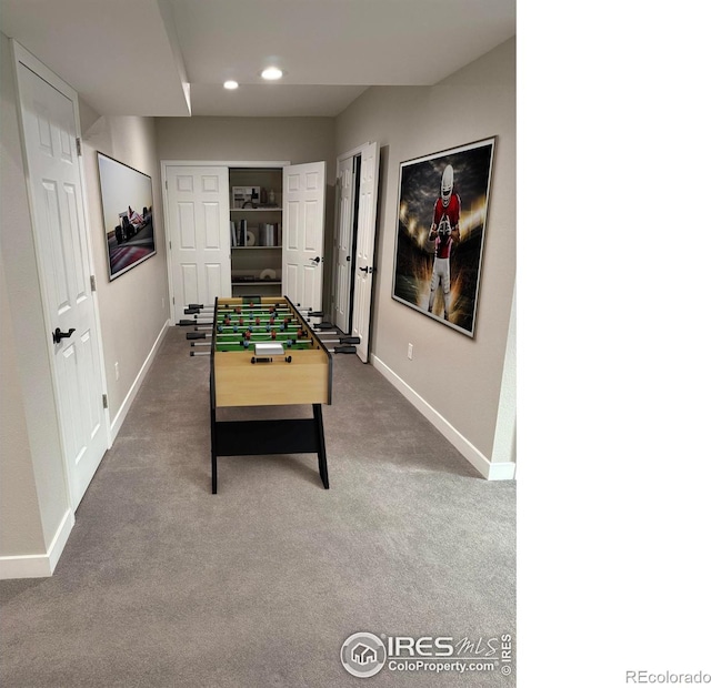 6506 Merrimack Dr, Castle Pines, CO 80108 - game room with baseboards, dark carpet, and recessed lighting