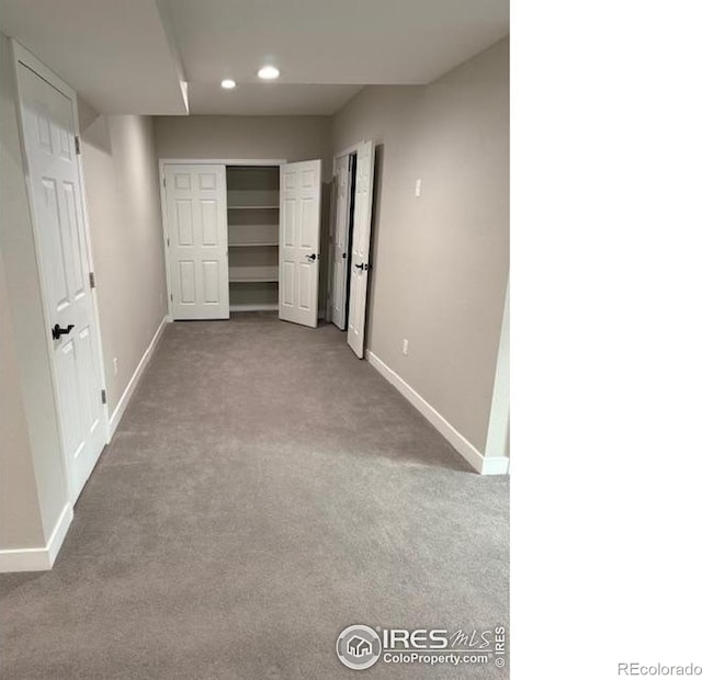 6506 Merrimack Dr, Castle Pines, CO 80108 - unfurnished bedroom featuring carpet flooring, baseboards, recessed lighting, and a closet