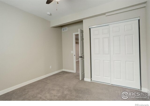 6506 Merrimack Dr, Castle Pines, CO 80108 - unfurnished bedroom featuring carpet floors, a closet, baseboards, and a ceiling fan