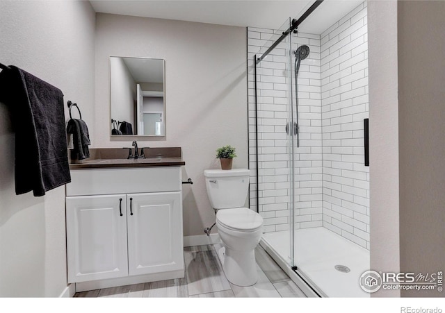 6506 Merrimack Dr, Castle Pines, CO 80108 - full bath featuring a stall shower, toilet, and vanity