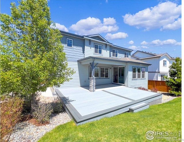 6506 Merrimack Dr, Castle Pines, CO 80108 - rear view of property with a wooden deck