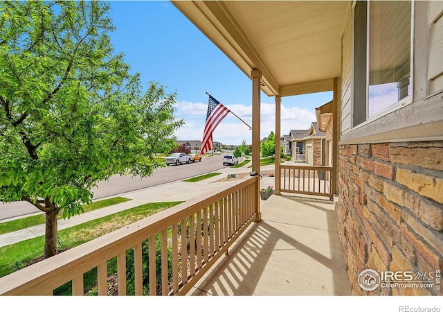 711 Mt Evans Ave, Severance, CO 80550 - balcony with a porch