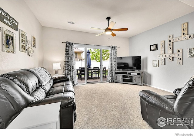 711 Mt Evans Ave, Severance, CO 80550 - carpeted living area featuring ceiling fan and baseboards
