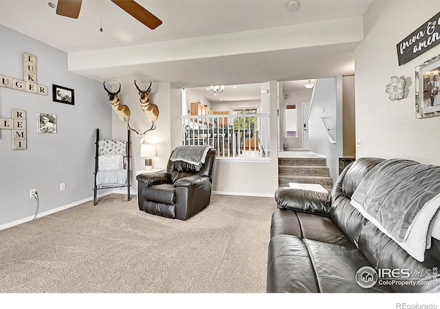 711 Mt Evans Ave, Severance, CO 80550 - living room with carpet floors, stairway, ceiling fan, and baseboards