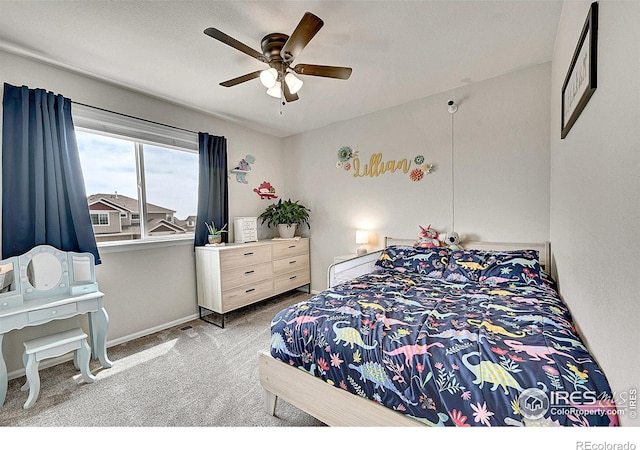 711 Mt Evans Ave, Severance, CO 80550 - carpeted bedroom with ceiling fan and baseboards