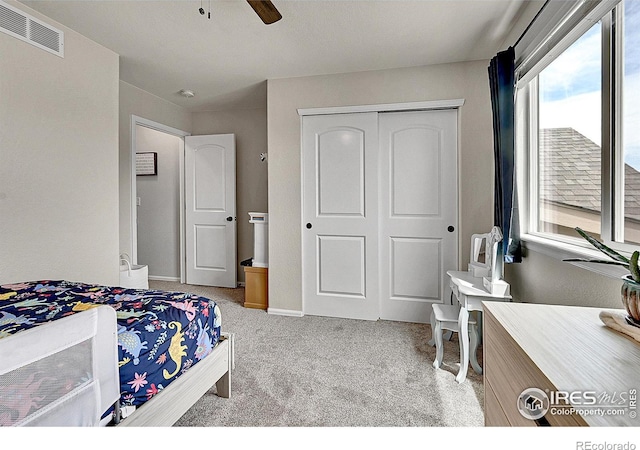711 Mt Evans Ave, Severance, CO 80550 - bedroom with carpet, a closet, ceiling fan, and baseboards
