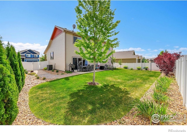711 Mt Evans Ave, Severance, CO 80550 - view of yard with cooling unit and a patio area