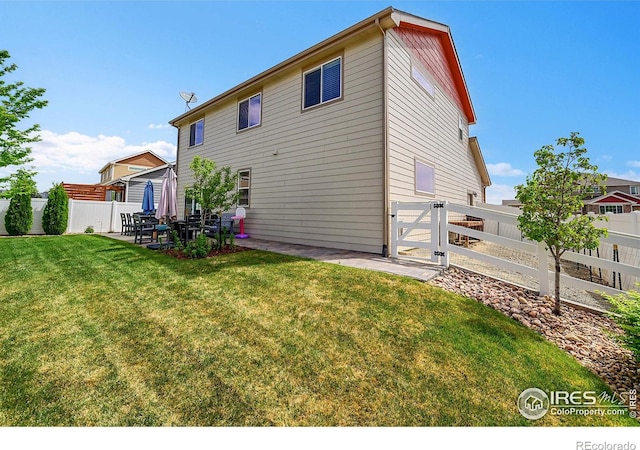 711 Mt Evans Ave, Severance, CO 80550 - rear view of property featuring a patio area
