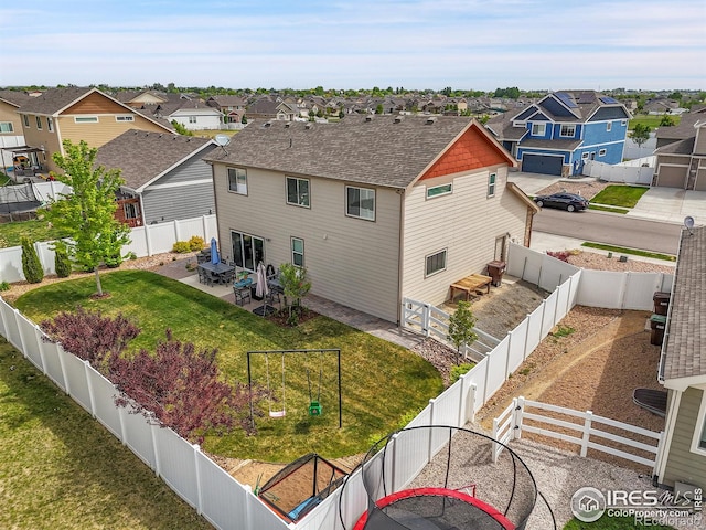 711 Mt Evans Ave, Severance, CO 80550 - rear view of house with a residential view and a patio