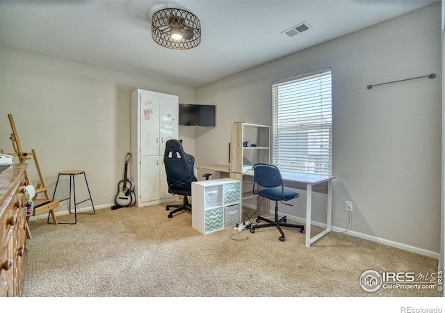 office space with carpet flooring and baseboards