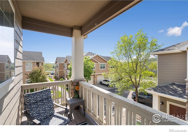 balcony featuring a residential view