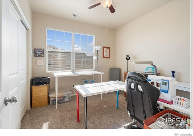 office with ceiling fan and carpet floors