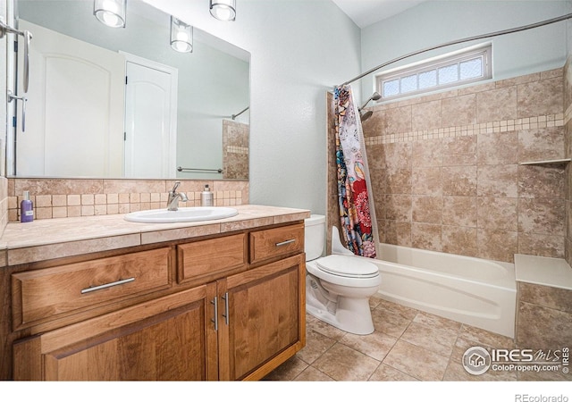 4609 Freehold Dr, Windsor, CO 80550 - full bath featuring vanity, shower / bath combination with curtain, backsplash, and tile patterned flooring