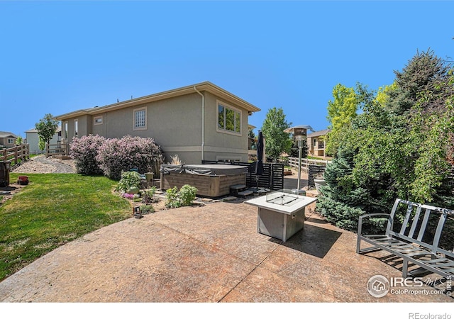 4609 Freehold Dr, Windsor, CO 80550 - view of patio with a hot tub