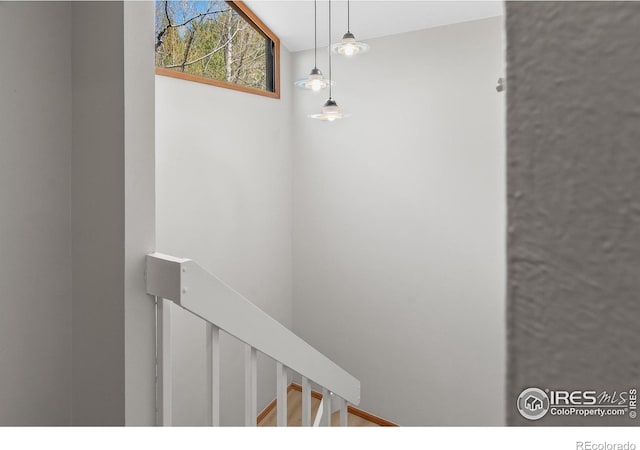 4888 Silver Spruce Ln, Evergreen, CO 80439 - corridor with an upstairs landing