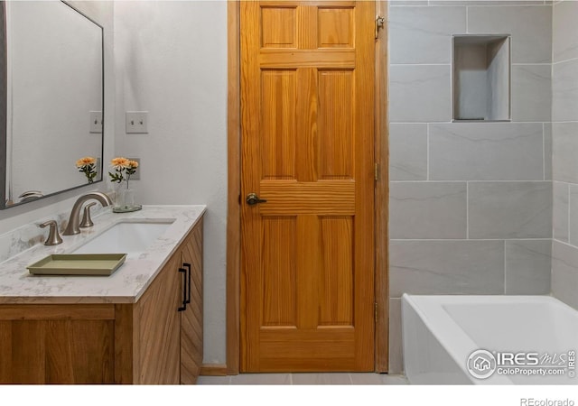 4888 Silver Spruce Ln, Evergreen, CO 80439 - bathroom with vanity and a bath