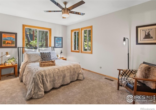 4888 Silver Spruce Ln, Evergreen, CO 80439 - carpeted bedroom featuring baseboards and a ceiling fan