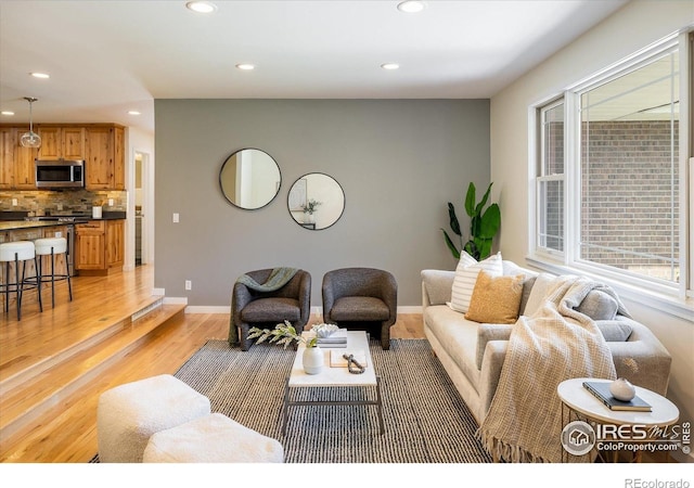 4760 Lee Cir, Boulder, CO 80303 - living area with recessed lighting, plenty of natural light, light wood-type flooring, and baseboards