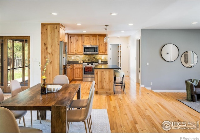 4760 Lee Cir, Boulder, CO 80303 - dining space featuring light wood finished floors, baseboards, and recessed lighting