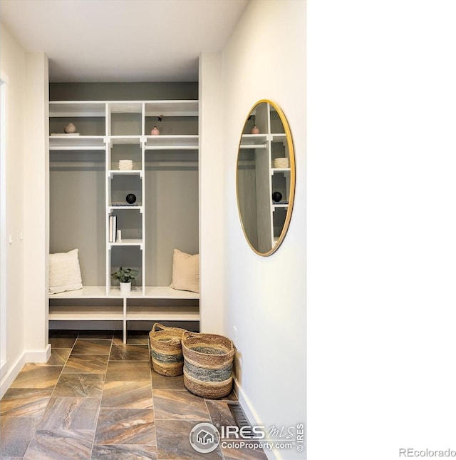 4760 Lee Cir, Boulder, CO 80303 - mudroom featuring baseboards