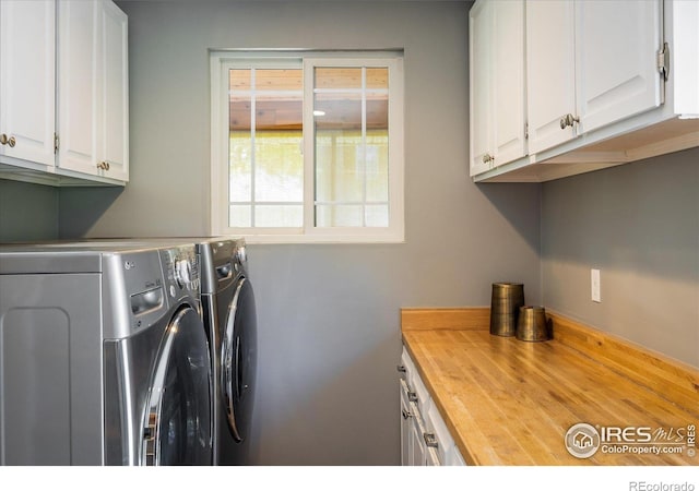 4760 Lee Cir, Boulder, CO 80303 - laundry area featuring cabinet space and washer and dryer