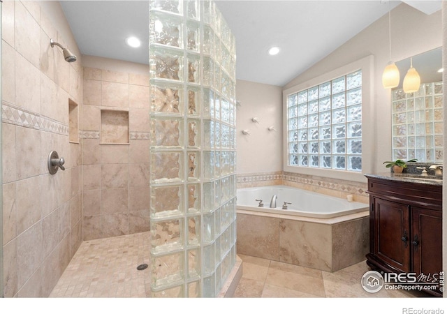 819 Gapter Rd, Boulder, CO 80303 - full bath with a walk in shower, a garden tub, vaulted ceiling, vanity, and recessed lighting