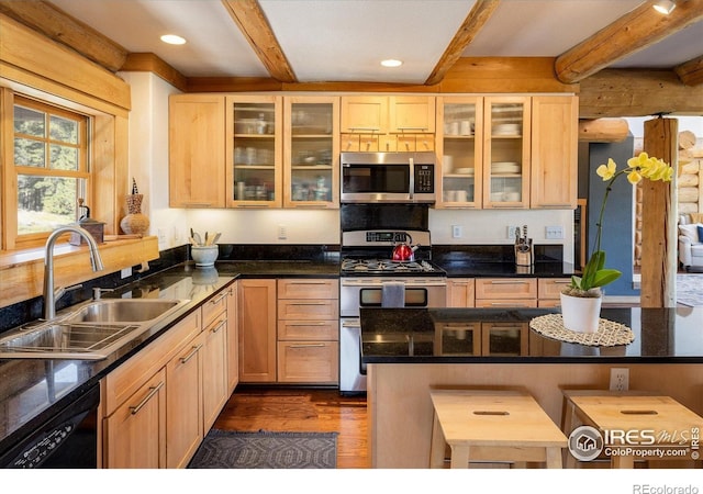 351 County Road 128n, Nederland, CO 80466 - kitchen with appliances with stainless steel finishes, a sink, beamed ceiling, light brown cabinets, and recessed lighting