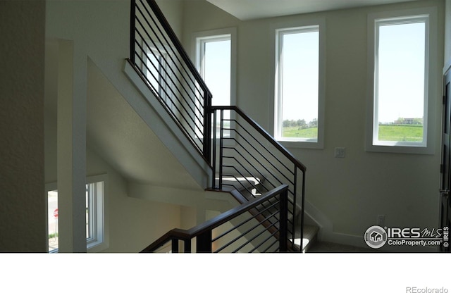 410 Superior Dr, Superior, CO 80027 - stairway with baseboards