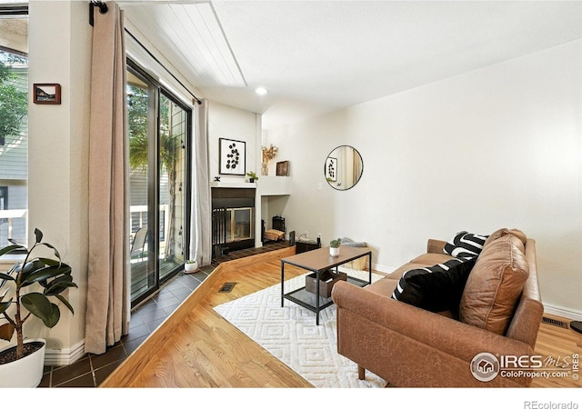 5016 Buckingham Rd Unit 4, Boulder, CO 80301 - living area with a fireplace, plenty of natural light, and recessed lighting