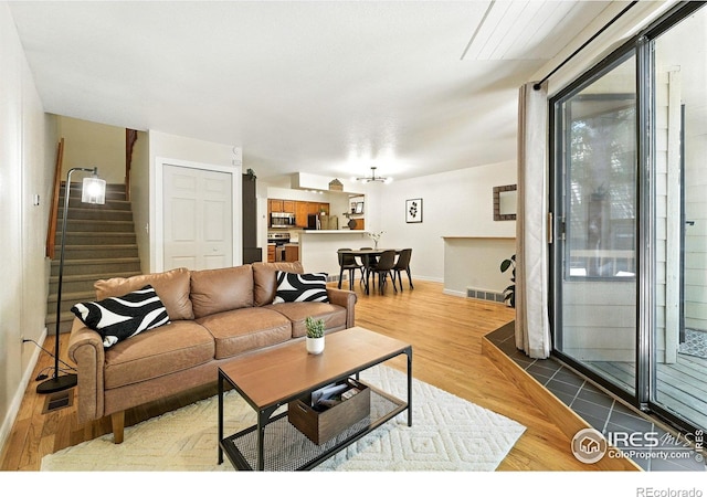 5016 Buckingham Rd Unit 4, Boulder, CO 80301 - living room with stairs and wood finished floors