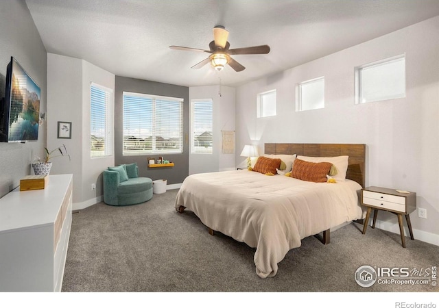 bedroom with carpet floors, baseboards, and ceiling fan