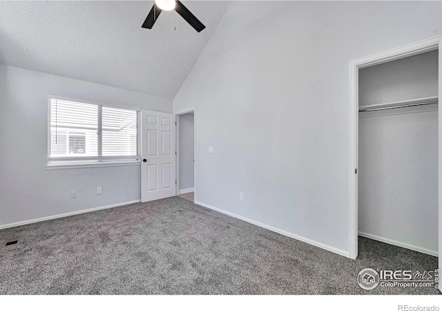 12525 E Tennessee Cir Unit E, Aurora, CO 80012 - unfurnished bedroom featuring carpet floors, a closet, a ceiling fan, high vaulted ceiling, and baseboards