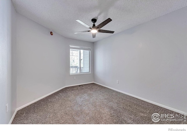 12525 E Tennessee Cir Unit E, Aurora, CO 80012 - unfurnished room featuring carpet flooring, a textured ceiling, ceiling fan, and baseboards