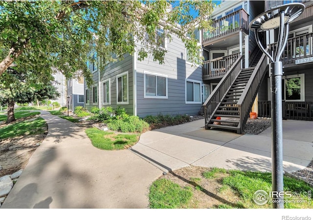 12525 E Tennessee Cir Unit E, Aurora, CO 80012 - view of property's community featuring stairway